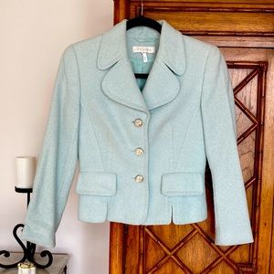 EUC Escada European Size 34.  Size 2 to 4 US. Light blue. Very formfitting!